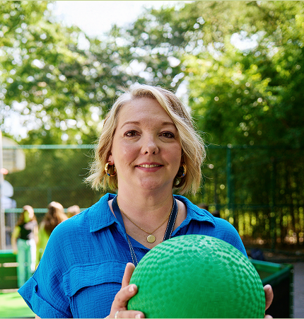 Rezdiffra patient holding green ball