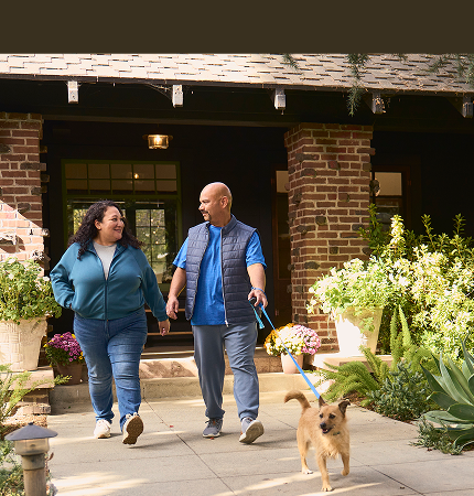Manuel, Rezdiffra patient walking with wife and dog