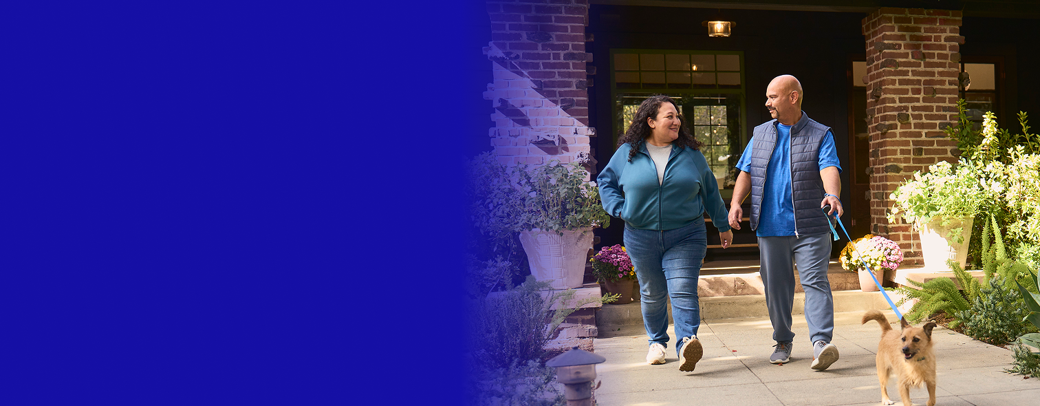 Manuel, Rezdiffra patient walking with wife and dog