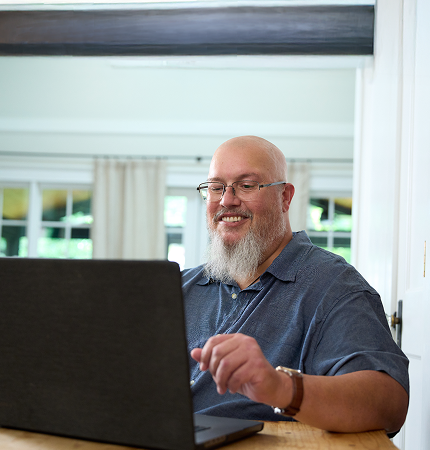 Rezdiffra patient using laptop